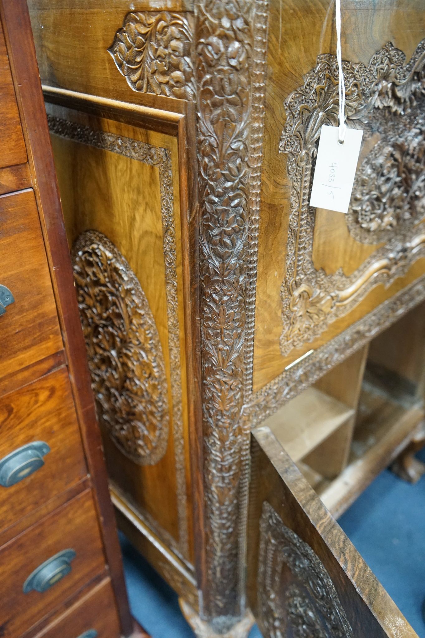 A Kashmiri carved hardwood cocktail cabinet, width 67cm, depth 42cm, height 96cm